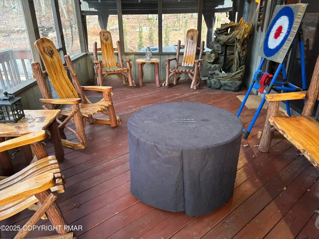 a view of an ocean with furniture