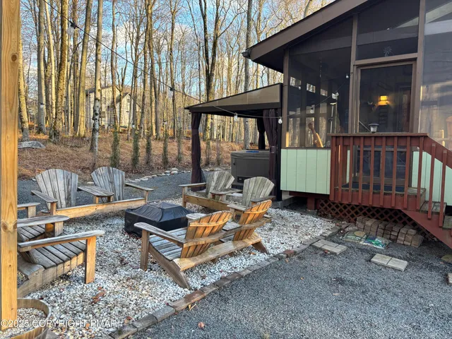 a view of a lounge chairs in the patio
