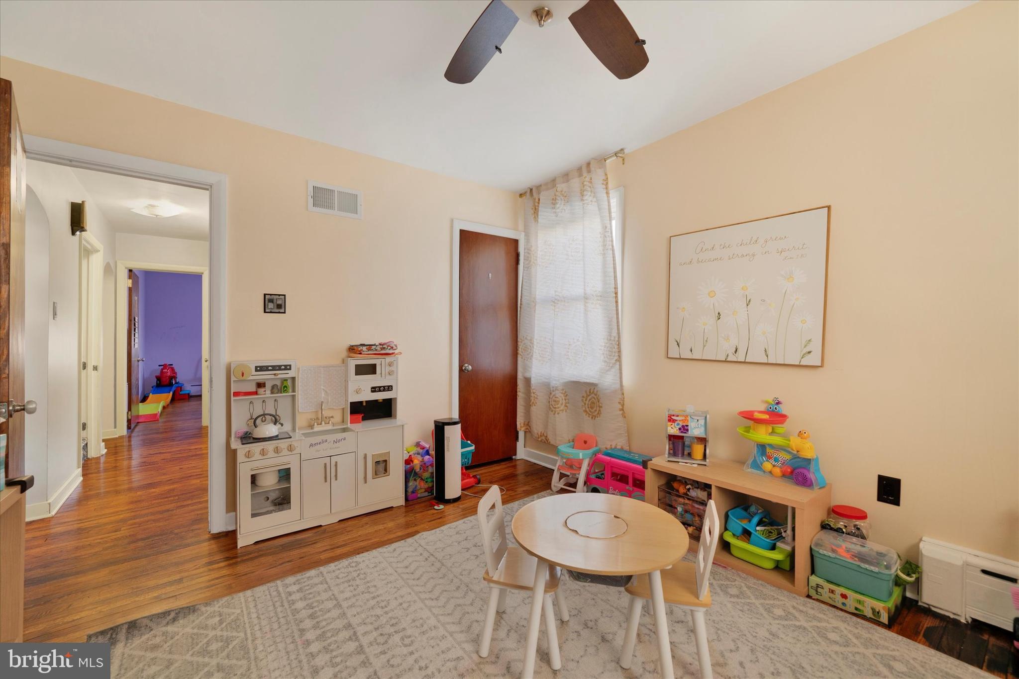 570 Oysterdale Road Oley, PA 19547 - Photo 12 of 26 a living room with furniture and a wooden floor