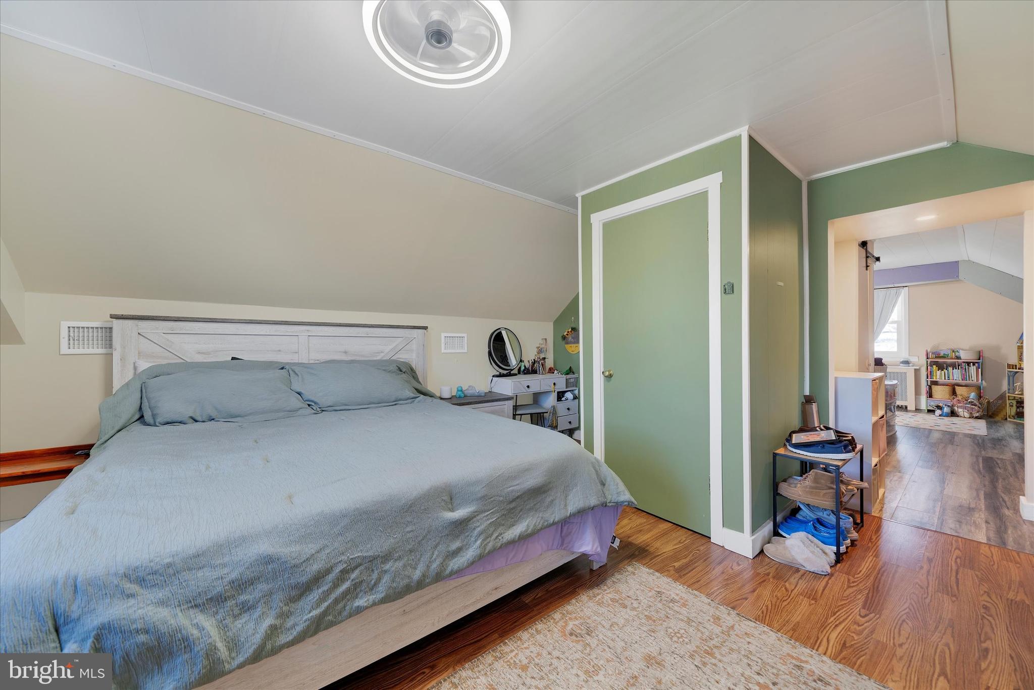 570 Oysterdale Road Oley, PA 19547 - Photo 13 of 26 a bedroom with a bed and a table in it