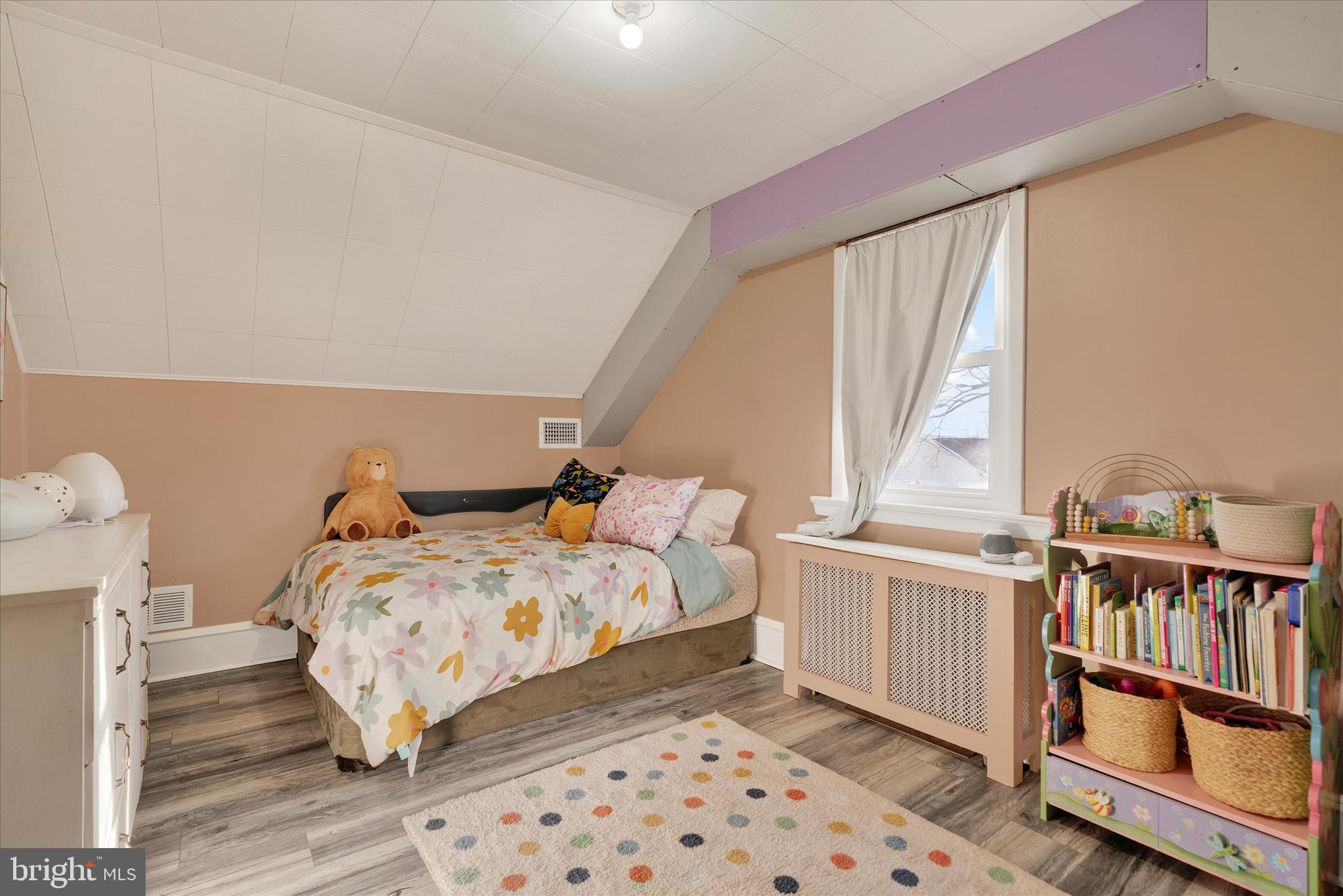 570 Oysterdale Road Oley, PA 19547 - Photo 15 of 26 a bedroom with a bed and a book shelf