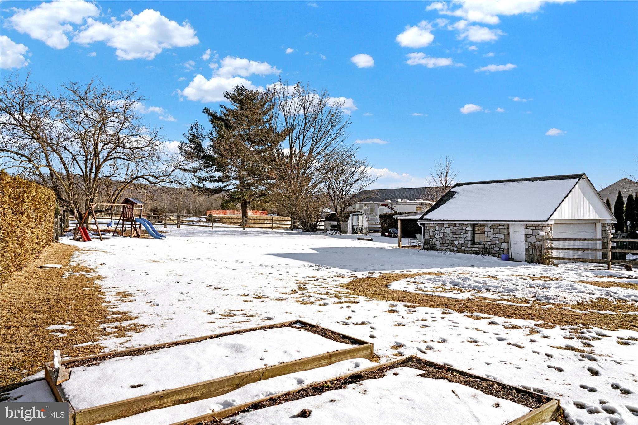 570 Oysterdale Road Oley, PA 19547 - Photo 24 of 26 a view of a yard covered in snow