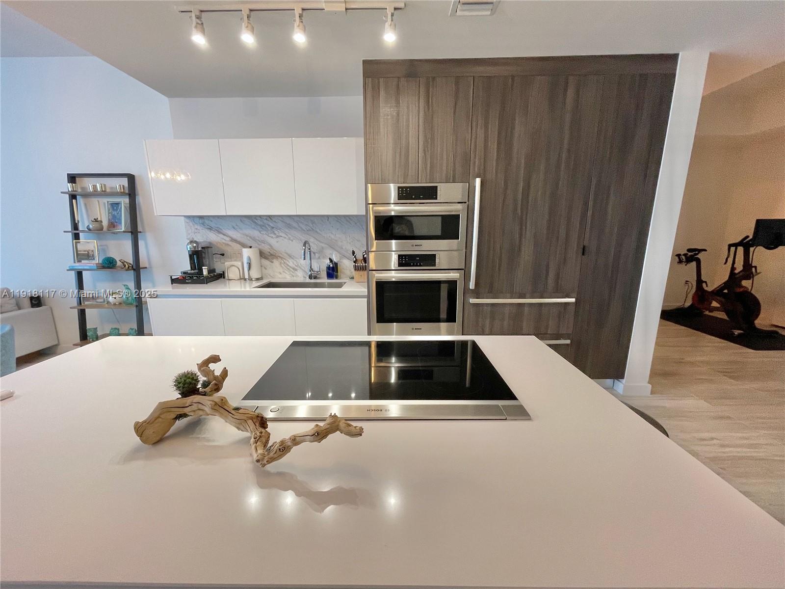 851 Northeast 1st Avenue, Unit 2605 Miami, FL 33132 - Photo 34 of 49 a living room with furniture