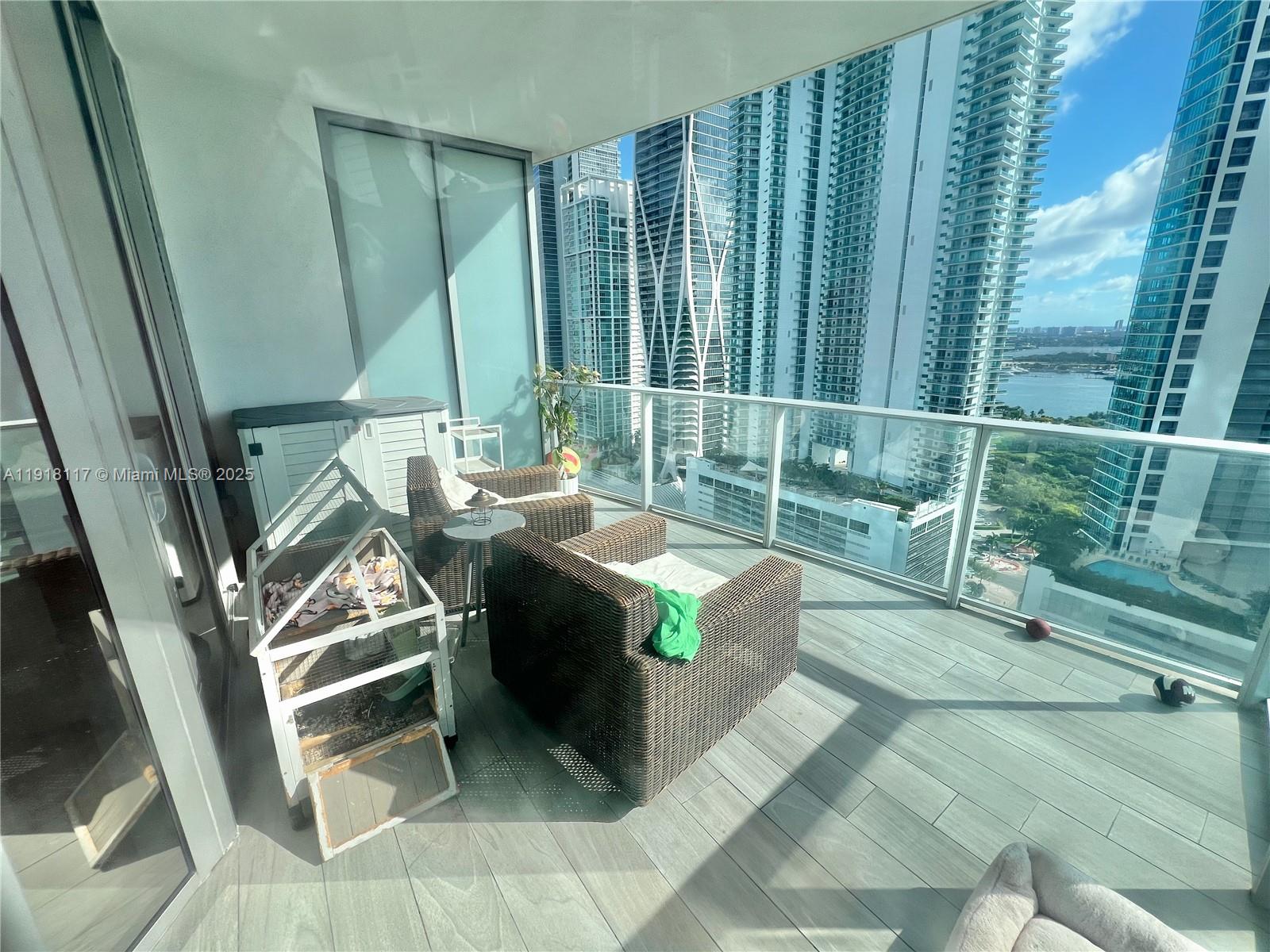 851 Northeast 1st Avenue, Unit 2605 Miami, FL 33132 - Photo 5 of 49 a view of balcony with couch