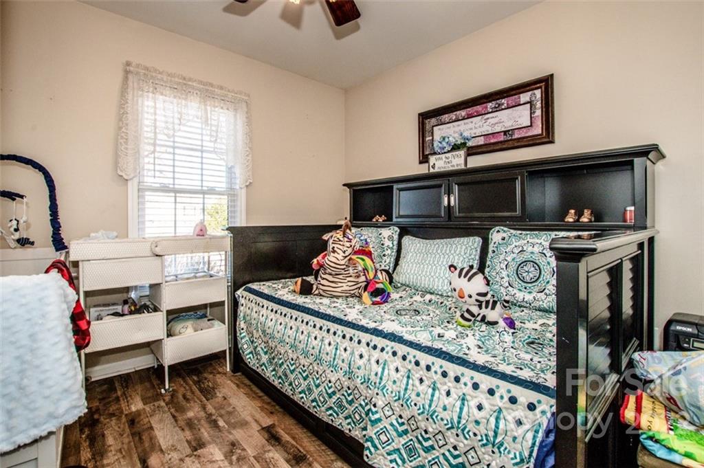 290 Wagon Wheel Way Salisbury, NC 28147 - Photo 13 of 17 a bedroom with furniture and a bed