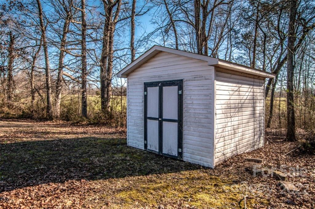 290 Wagon Wheel Way Salisbury, NC 28147 - Photo 16 of 17 a view of a house with a yard