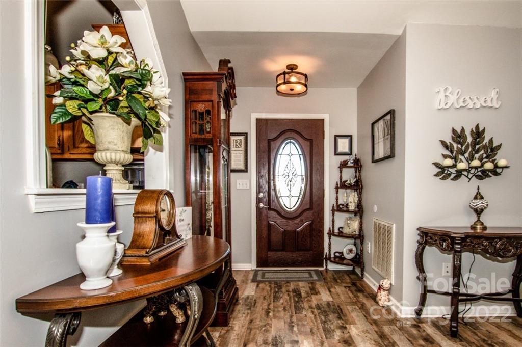 290 Wagon Wheel Way Salisbury, NC 28147 - Photo 4 of 17 a view of dining room filled with furniture and chandelier