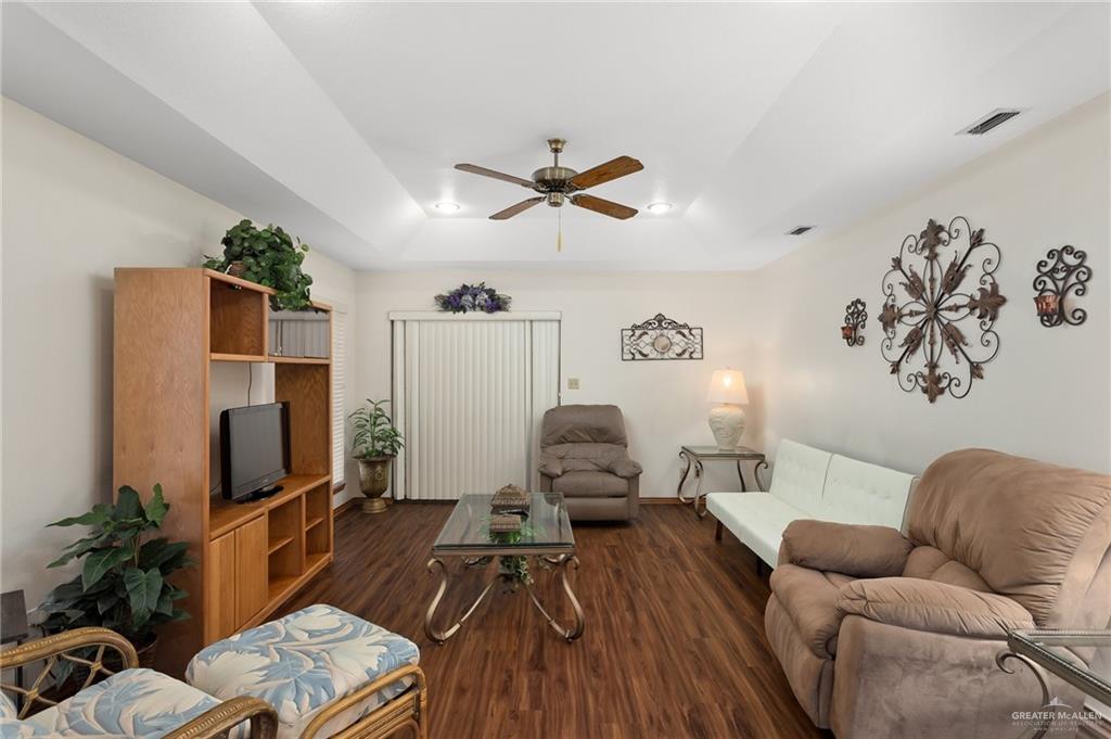 2602 Ashley Drive Pharr, TX 78577 - Photo 2 of 9 a living room with furniture and a flat screen tv