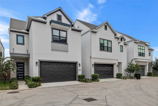 a front view of a house with yard