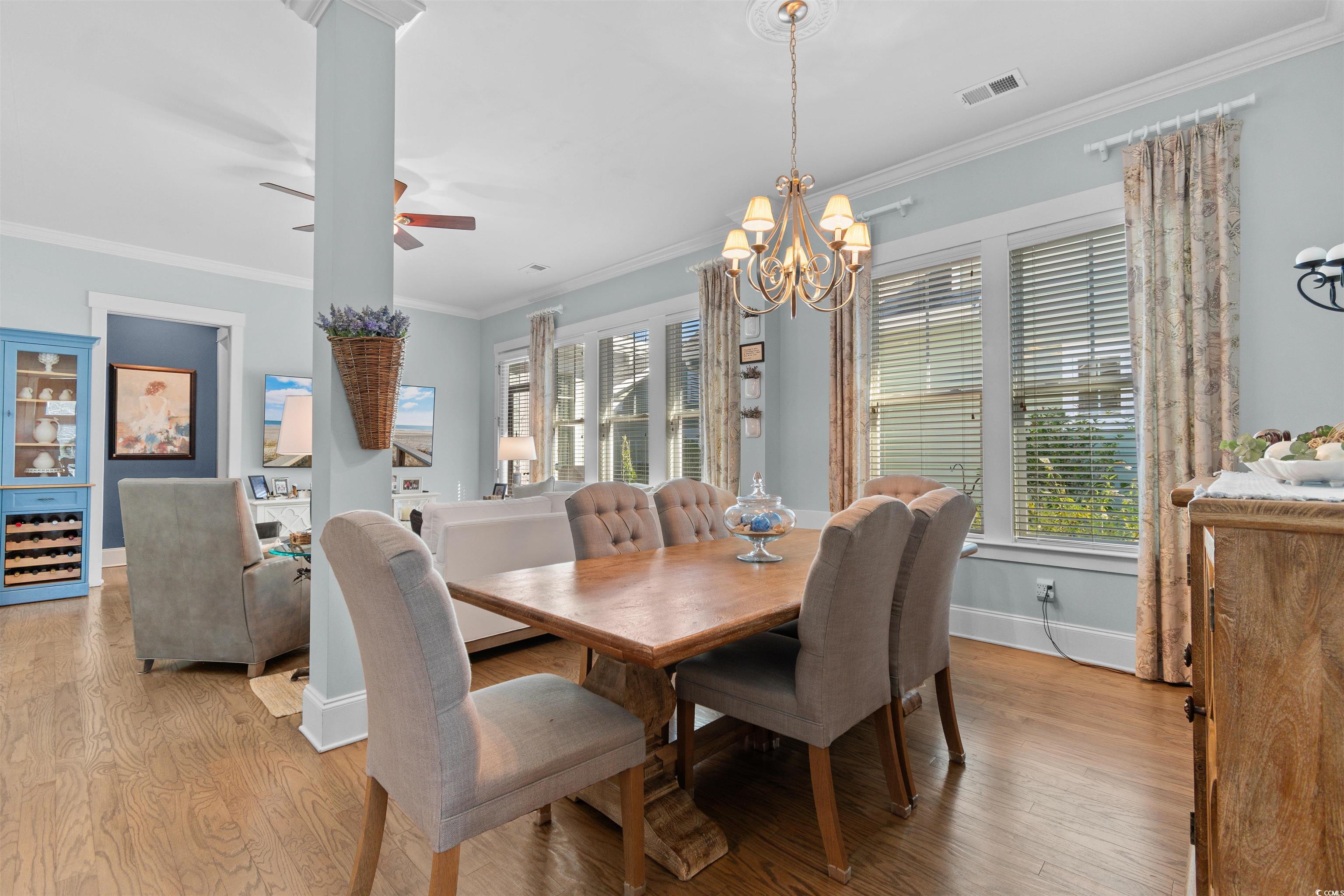 3448 Baldwin Lane Myrtle Beach, SC 29577 - Photo 10 of 30 Living area with ornamental molding and wood finished floors