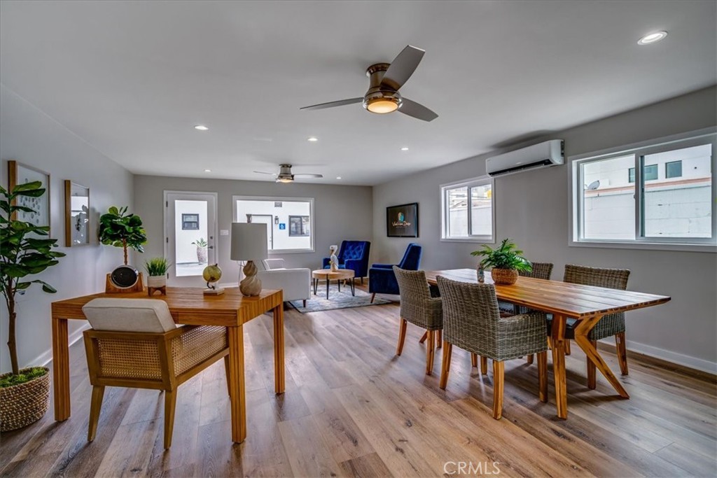 323 Culver Boulevard Playa del Rey, CA 90293 - Photo 14 of 58 a view of a dining room with furniture window and wooden floor