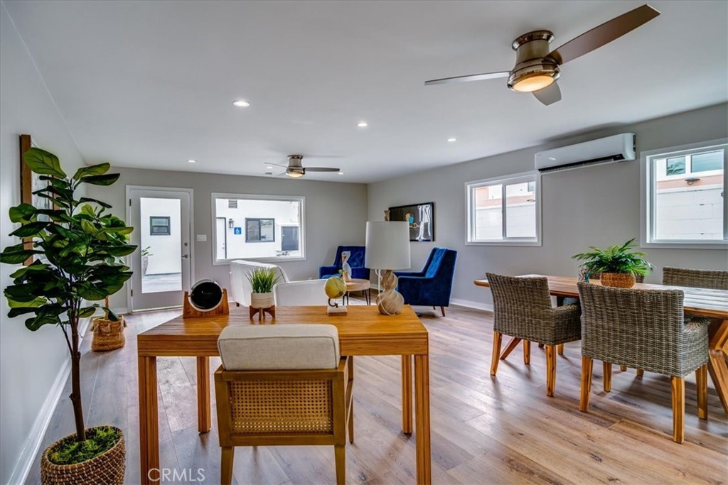323 Culver Boulevard Playa del Rey, CA 90293 - Photo 15 of 58 a view of a dining room with furniture window and wooden floor