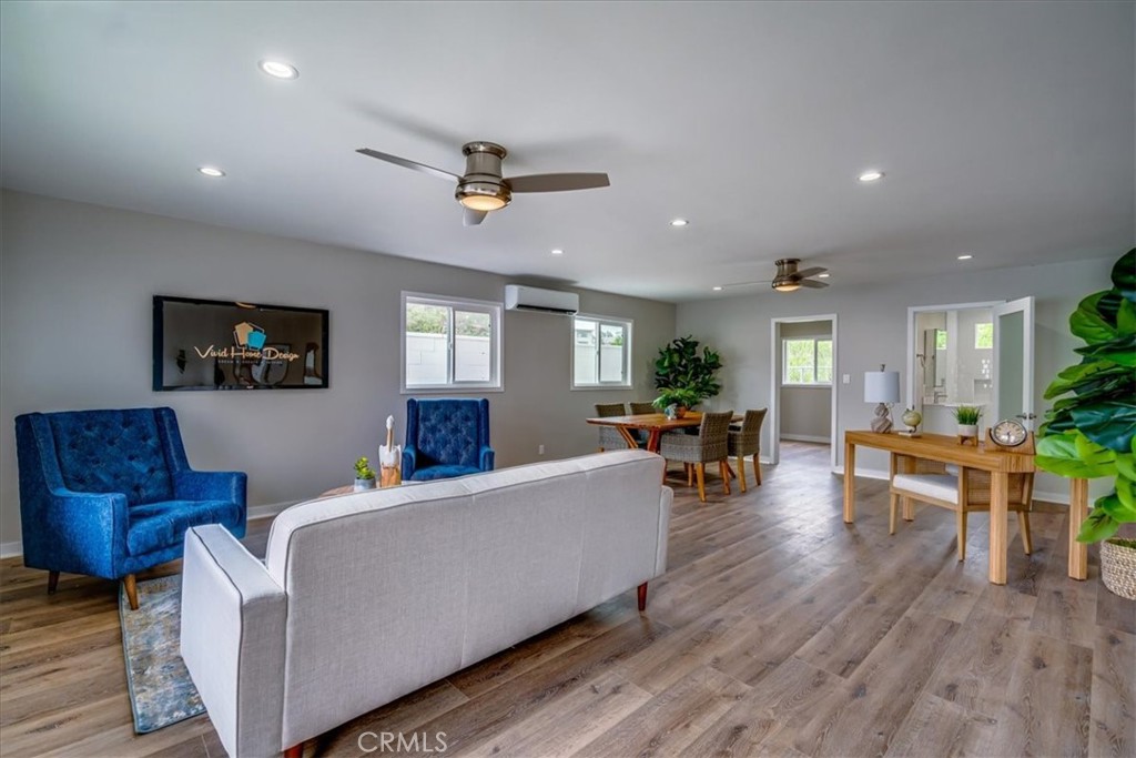 323 Culver Boulevard Playa del Rey, CA 90293 - Photo 24 of 58 a living room with furniture and a wooden floor