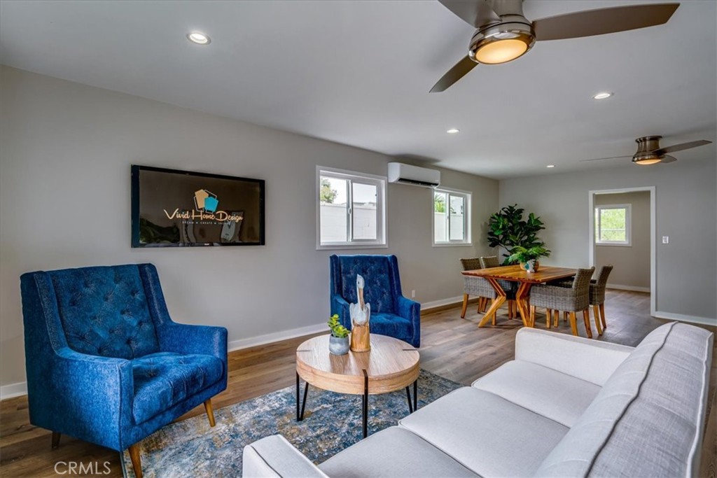 323 Culver Boulevard Playa del Rey, CA 90293 - Photo 25 of 58 a living room with furniture and a flat screen tv