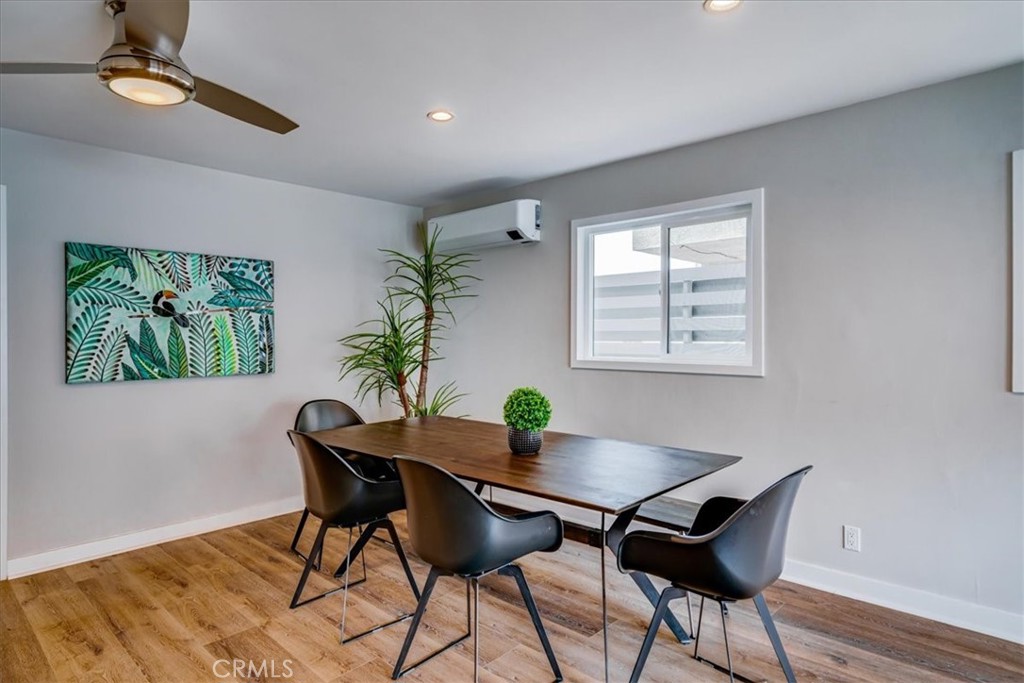 323 Culver Boulevard Playa del Rey, CA 90293 - Photo 33 of 58 a view of a dining room with furniture and wooden floor