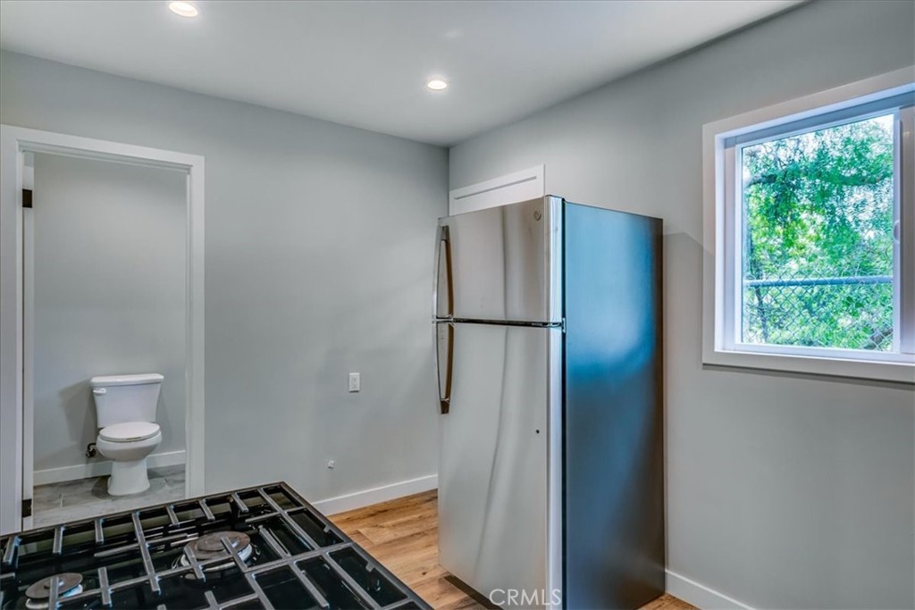 323 Culver Boulevard Playa del Rey, CA 90293 - Photo 38 of 58 a bathroom with a toilet and a shower
