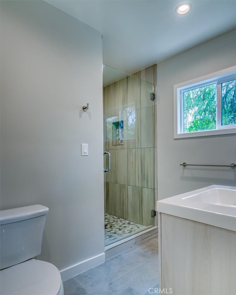 323 Culver Boulevard Playa del Rey, CA 90293 - Photo 41 of 58 a bathroom with a sink and toilet