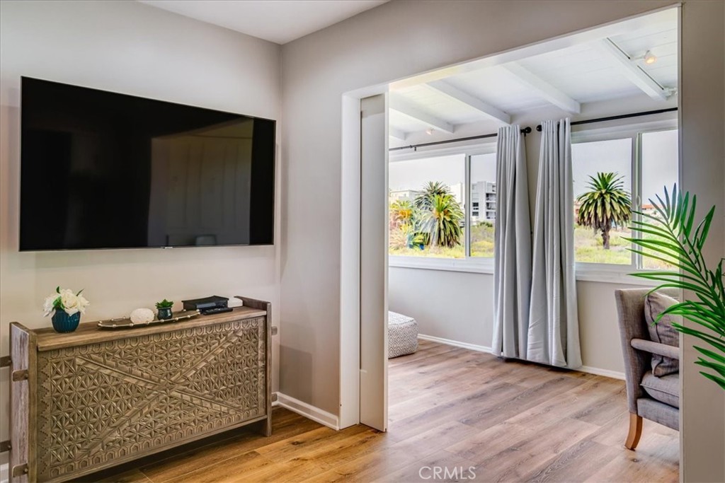323 Culver Boulevard Playa del Rey, CA 90293 - Photo 45 of 58 a living room with furniture and a flat screen tv