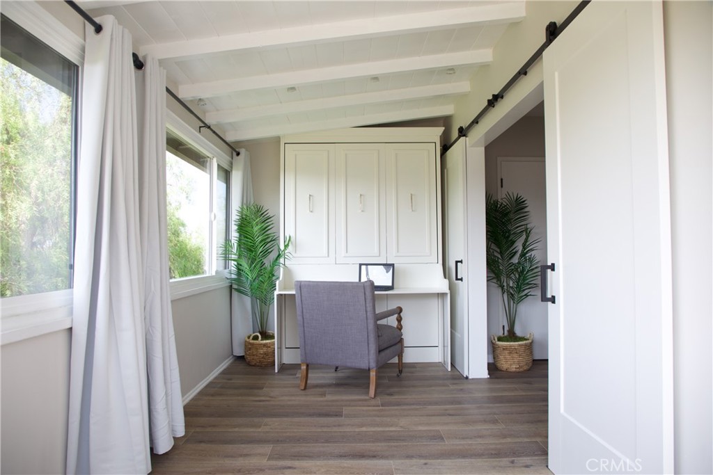 323 Culver Boulevard Playa del Rey, CA 90293 - Photo 47 of 58 a view of a hallway and an dining rom with furniture