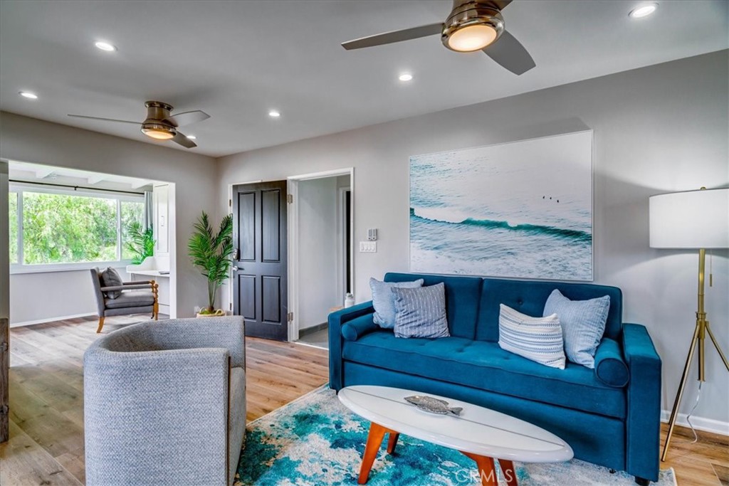 323 Culver Boulevard Playa del Rey, CA 90293 - Photo 51 of 58 a living room with furniture and a large window
