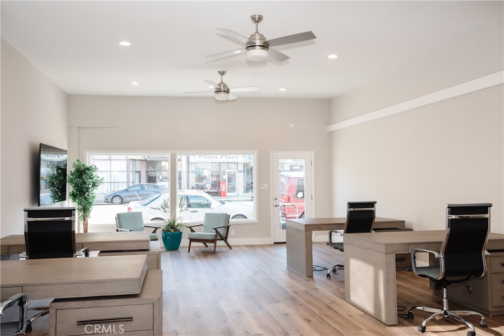 323 Culver Boulevard Playa del Rey, CA 90293 - Photo 6 of 58 a view of a workspace with furniture and a window