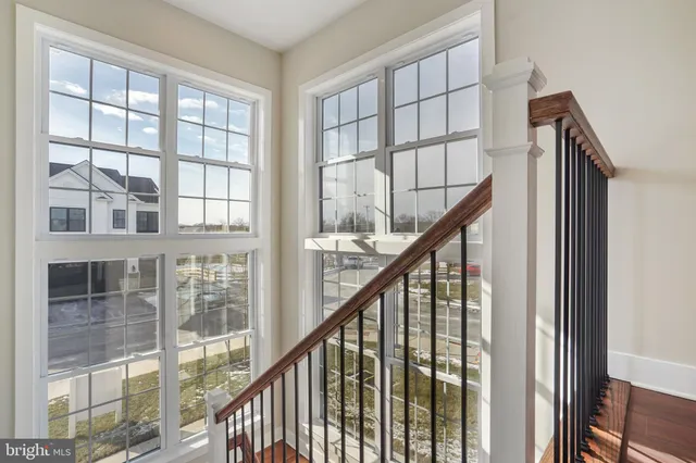a view of staircase with large window