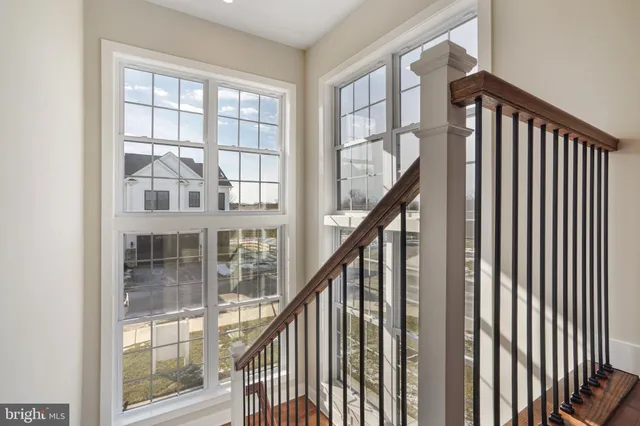 a view of staircase with large window