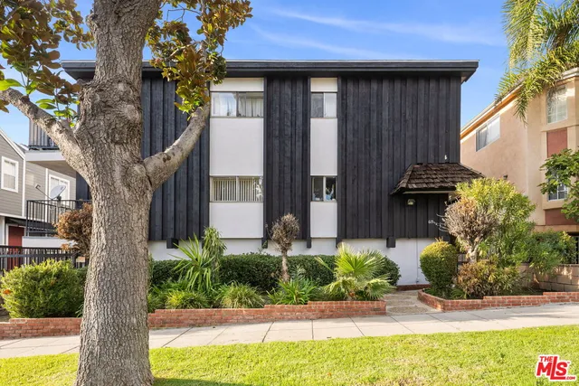 a front view of a house having yard