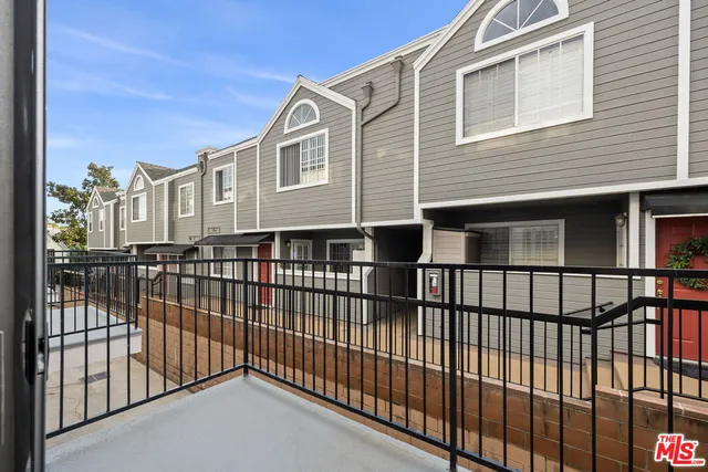 a view of a houses with a balcony