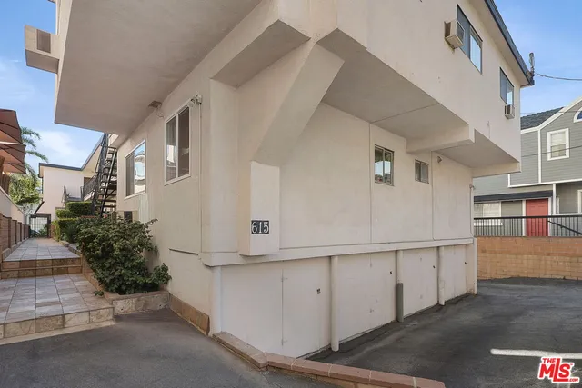 a view of a street with buildings