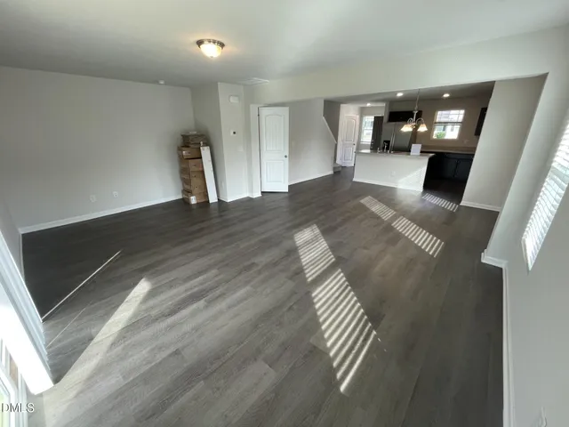 a bathroom with a sink toilet and mirror