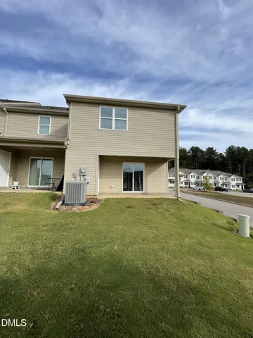 a house view with a garden space