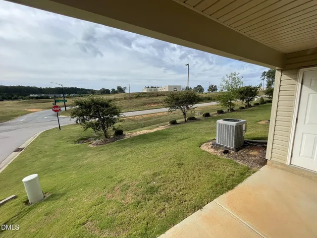 a view of house with outdoor space