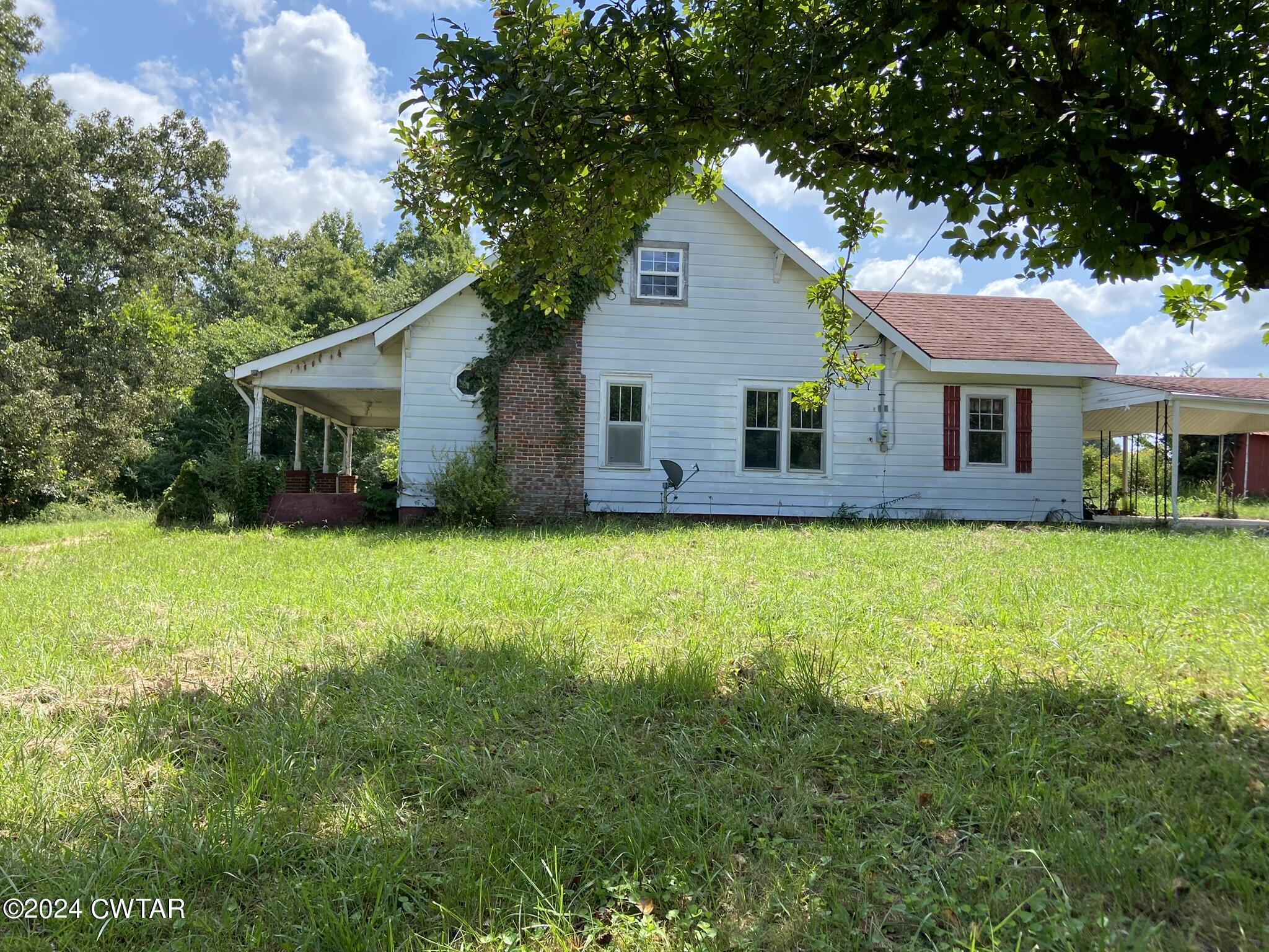 2160 Jones Road Luray, TN 38352 - Photo 3 of 8 a view of house with a yard