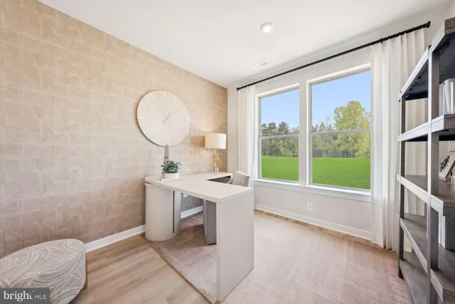 a bathroom with a sink a mirror and a bathtub