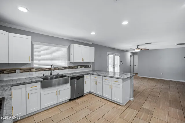 a bathroom with a toilet and a bathtub