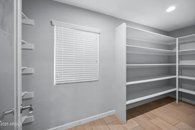 a bathroom with a toilet sink and shower