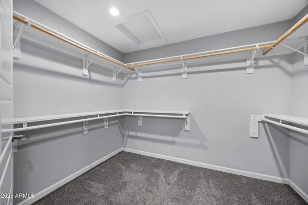 a bathroom with a toilet sink and shower