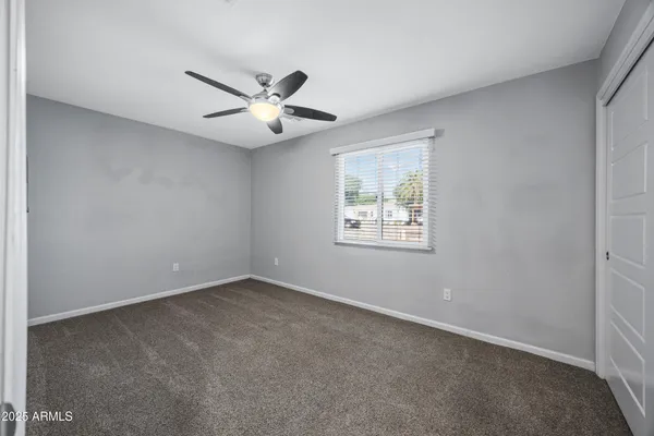a view of an empty walk in closet