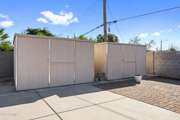 a swimming pool with a outdoor seating