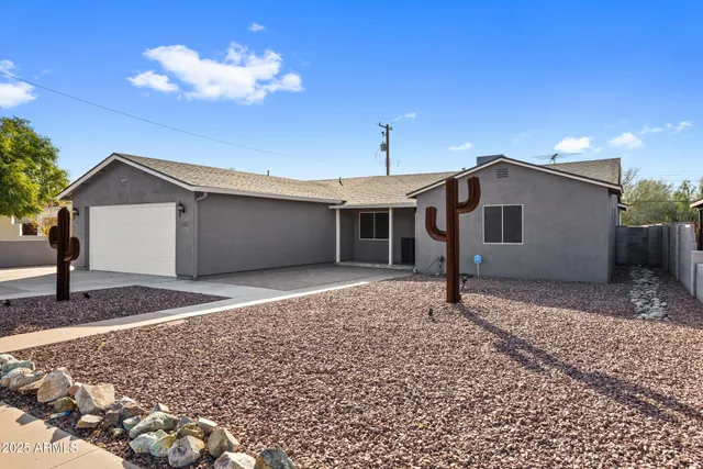 a view of a kitchen with a sink and a stove top oven