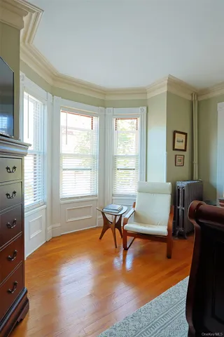 a bathroom with a bathtub a sink and a shower