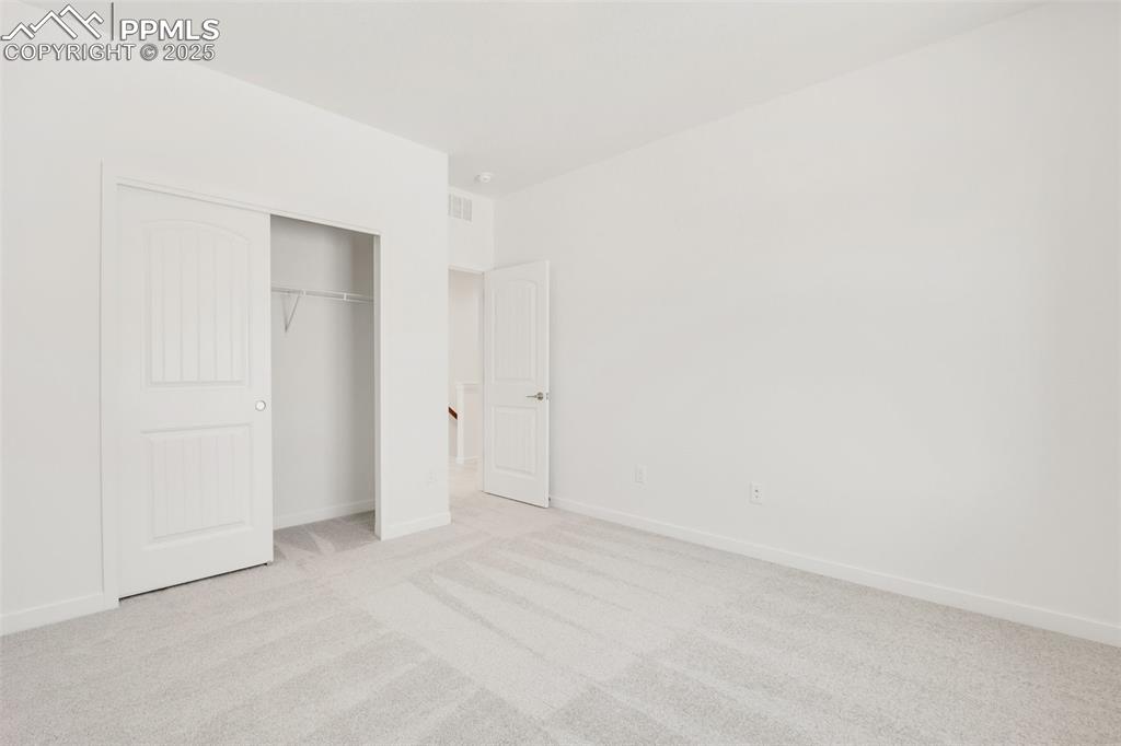 8156 Manor House Way Colorado Springs, CO 80908 - Photo 26 of 35 a view of an empty room