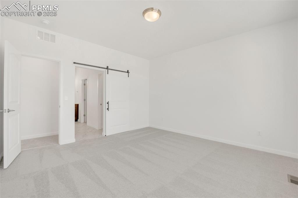 8156 Manor House Way Colorado Springs, CO 80908 - Photo 29 of 35 a view of an empty room