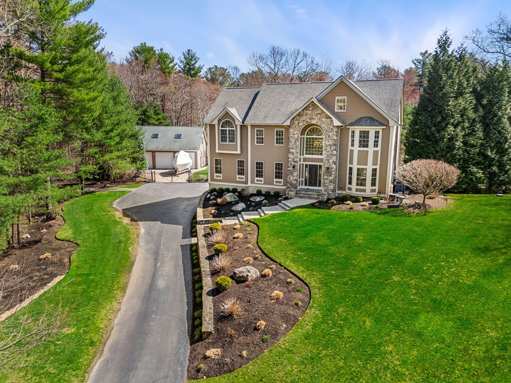 10 Sawyer Lane Middleton, MA 01949 - Photo 1 of 46 a aerial view of a house with swimming pool garden and trees