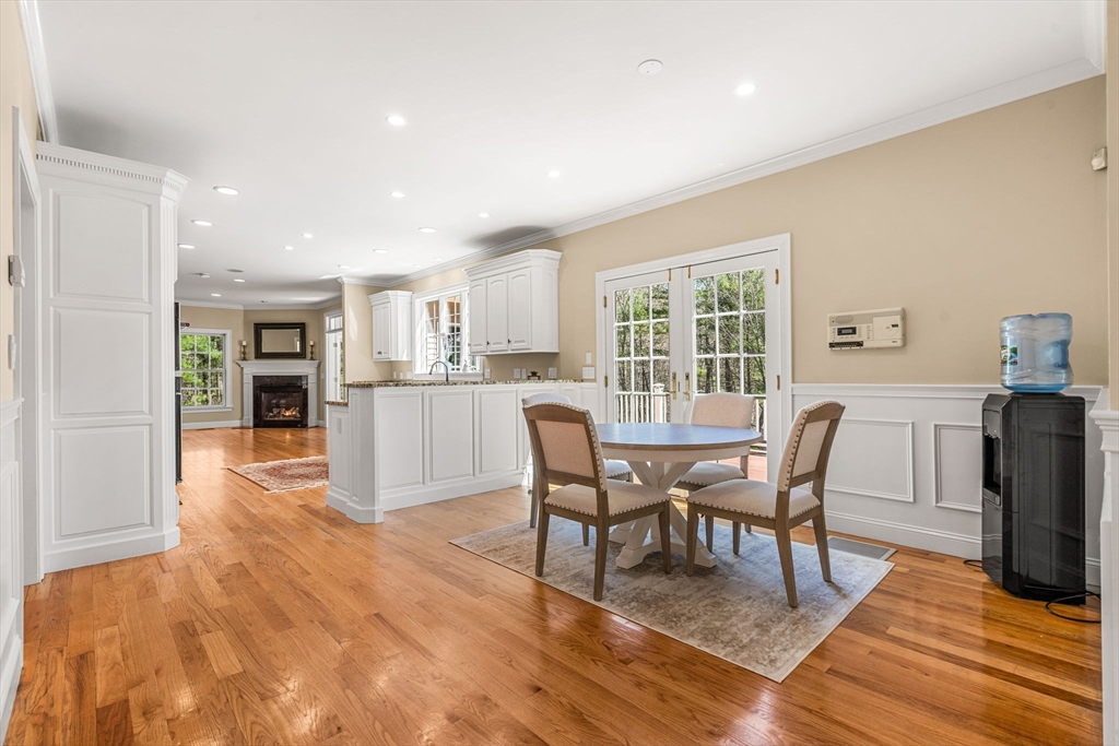 10 Sawyer Lane Middleton, MA 01949 - Photo 12 of 46 a view of a dining room with furniture and wooden floor