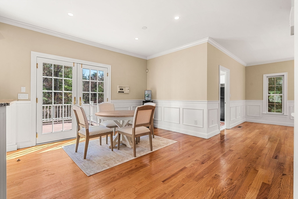 10 Sawyer Lane Middleton, MA 01949 - Photo 15 of 46 a view of a dining room with furniture and wooden floor