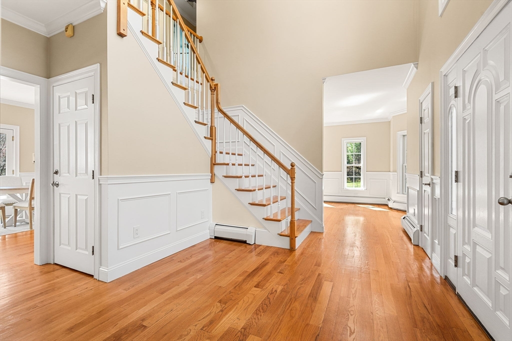 10 Sawyer Lane Middleton, MA 01949 - Photo 21 of 46 a view of an entryway with wooden floor