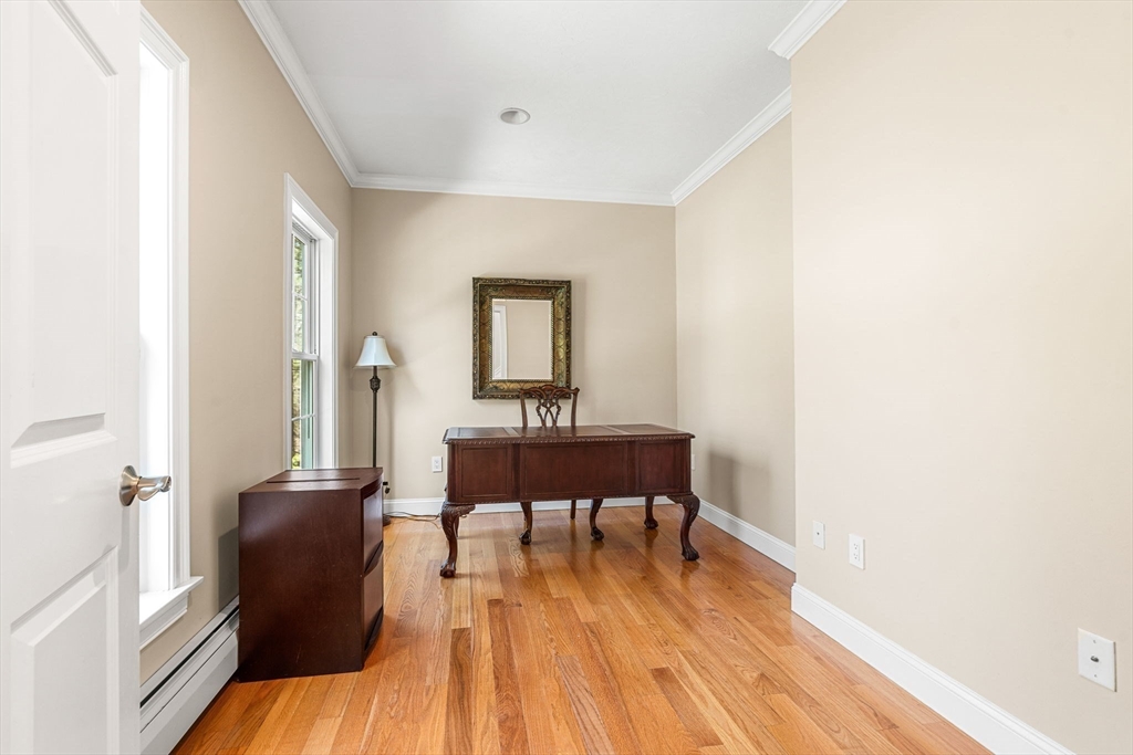 10 Sawyer Lane Middleton, MA 01949 - Photo 26 of 46 a view of a livingroom with furniture and wooden floor