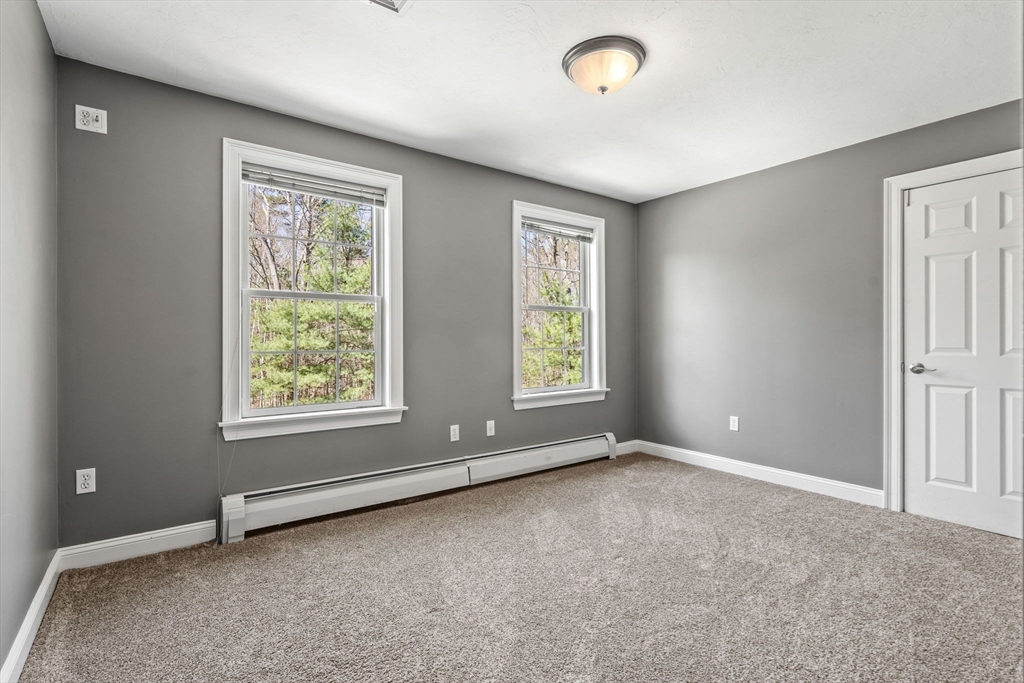 10 Sawyer Lane Middleton, MA 01949 - Photo 34 of 46 an empty room with windows